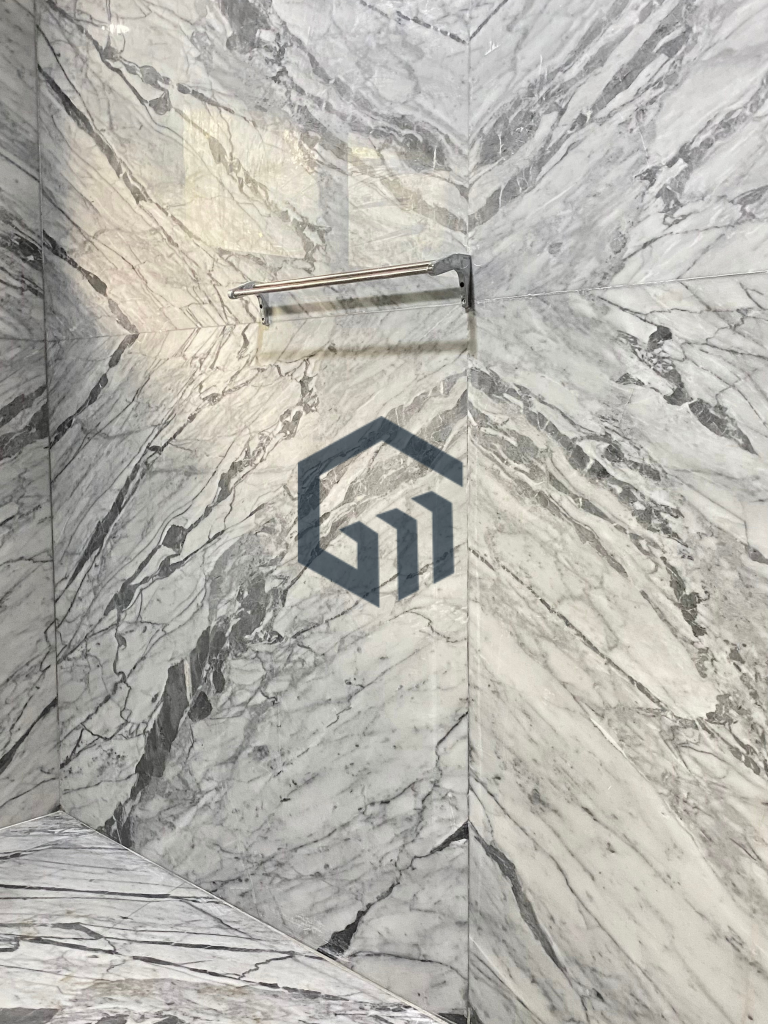 polished bookmatch marmer wall bathroom